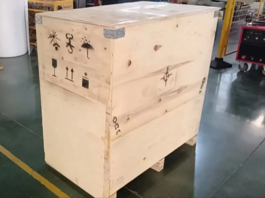 Heavy-duty wooden crating of stud welding machines for international shipping, highlighting compliance with logistics safety standards.