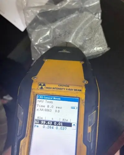 XRF analyzer showing high purity Aluminum Flux Balls test results meeting standard specifications.